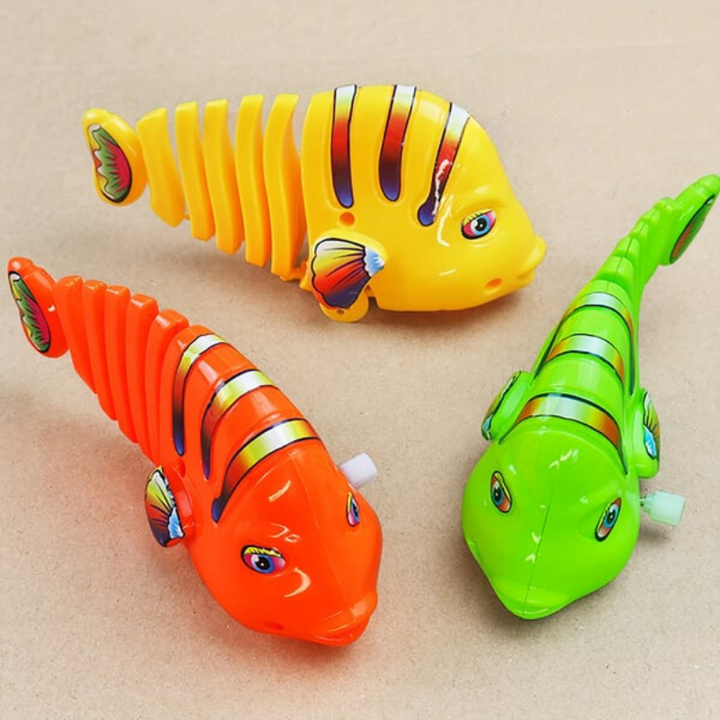FishyWinds - Juguete De Plástico Con Forma De Pez De Cuerda