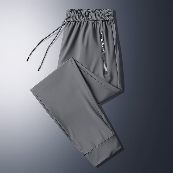GlideFit - Pantalones Unisex De SecadoRápido y Elasticidad Ultraelevada